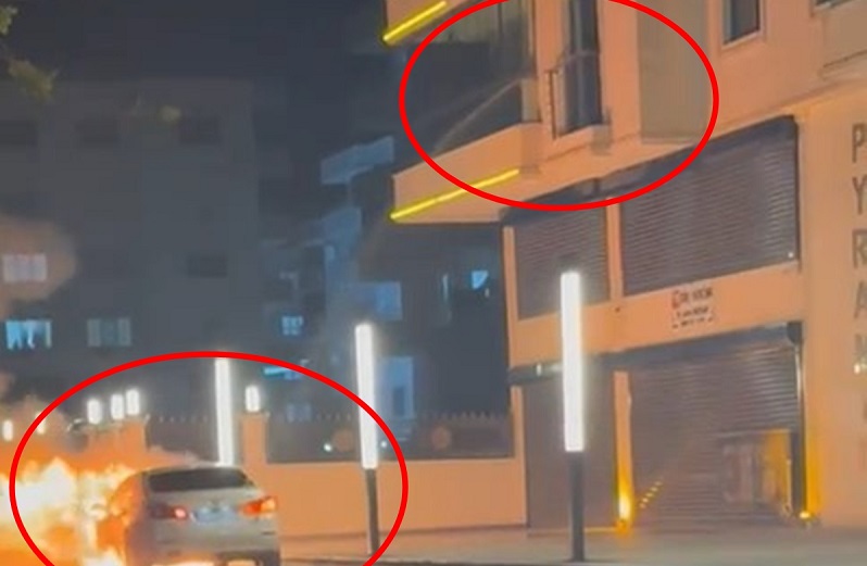 Alev alan otomobile balkondan su döktü